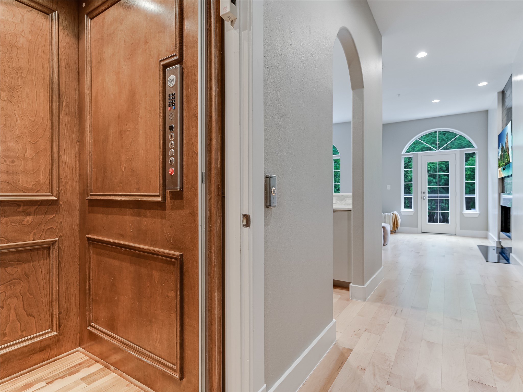 1529 Barton Springs Road, Unit 13 Austin, TX 78704 - Photo 13 of 35 a view of a hallway with windows and chandelier
