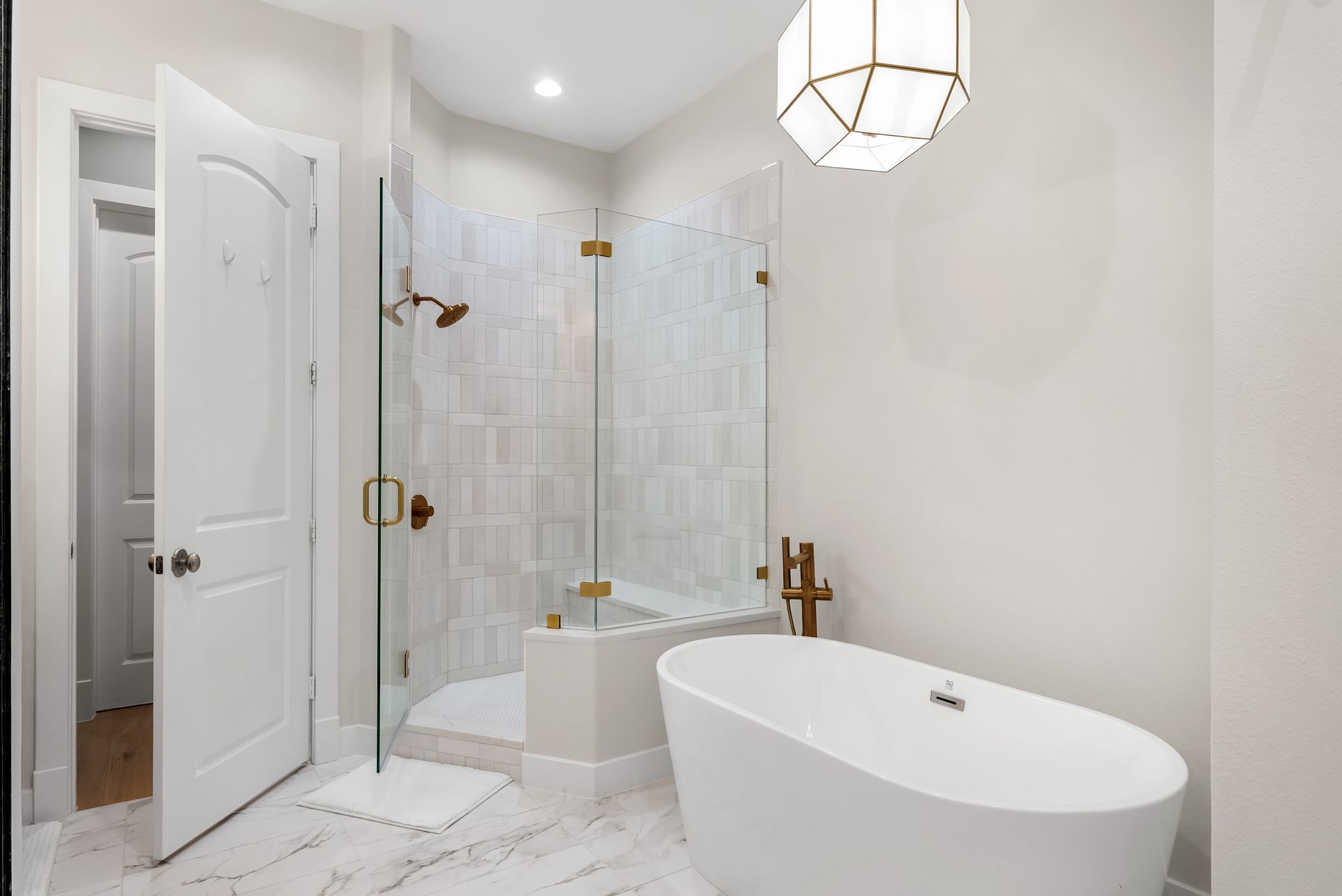 1529 Barton Springs Road, Unit 13 Austin, TX 78704 - Photo 17 of 35 a bathroom with a white bath tub a shower and a sink