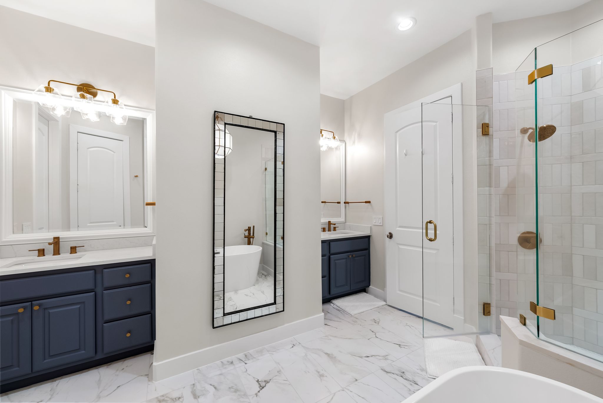 1529 Barton Springs Road, Unit 13 Austin, TX 78704 - Photo 18 of 35 a spacious bathroom with a shower sink and mirror