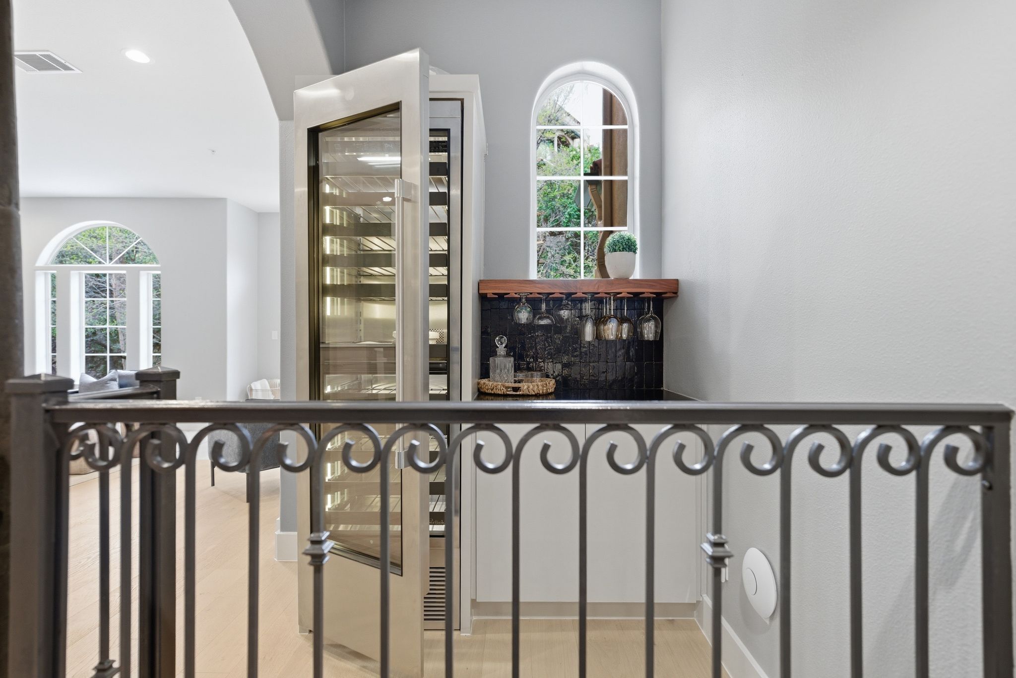 1529 Barton Springs Road, Unit 13 Austin, TX 78704 - Photo 7 of 35 a view of a entryway with wooden floor and windows