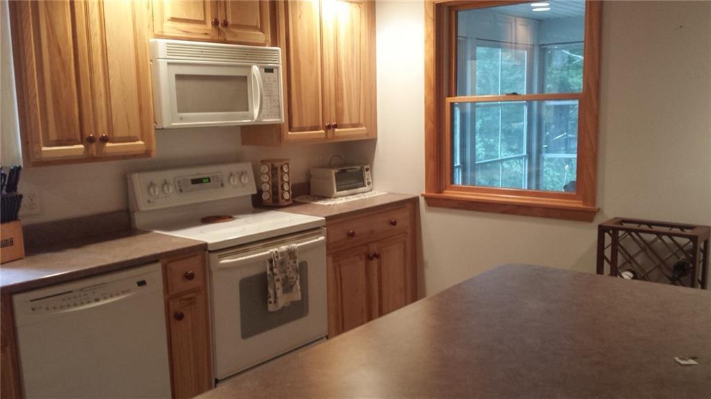 46 Silvaqua Road Otisfield, ME 04270 - Photo 17 of 35 Nice kitchen view with porch just...