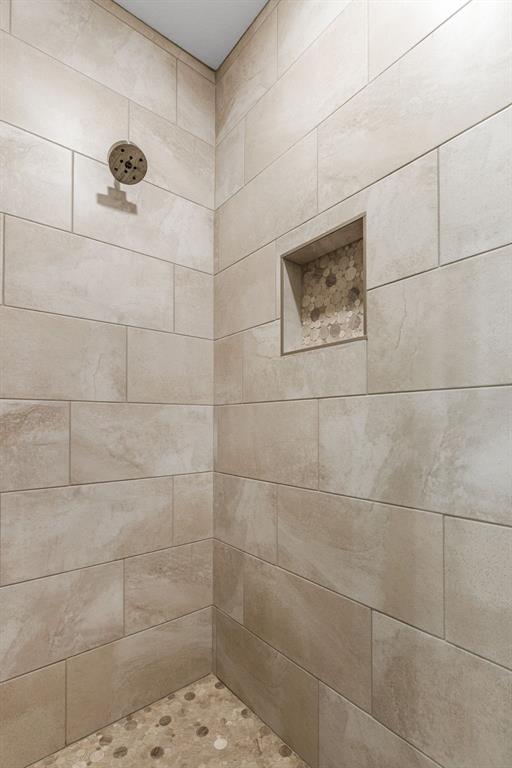 515 Sales Road Windthorst, TX 76389 - Photo 24 of 34 a bathroom with a shower