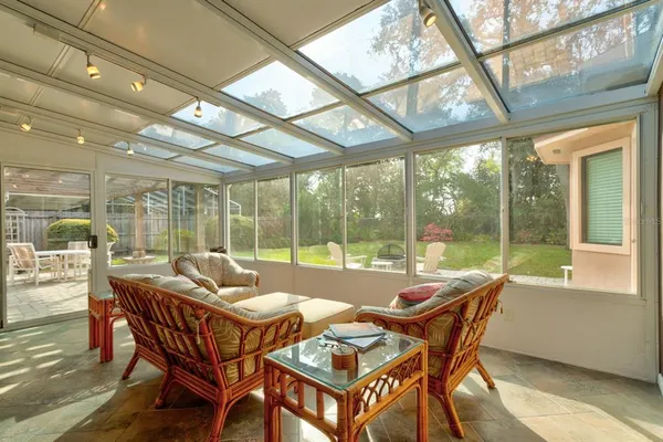 a patio with yard table and chairs