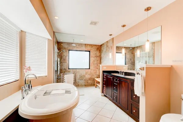 a bathroom with a sink a washer and dryer