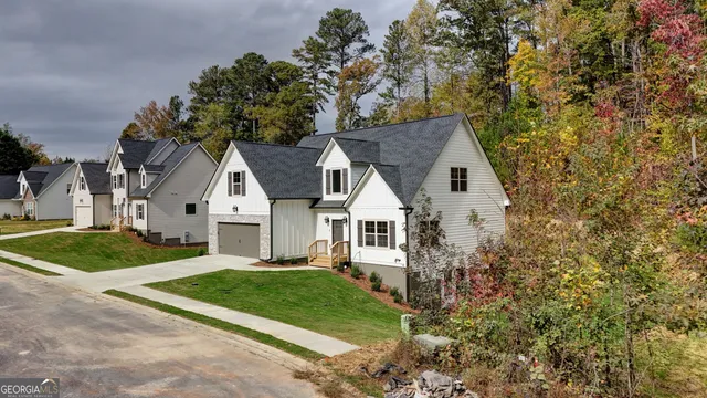 front view of a house with a yard