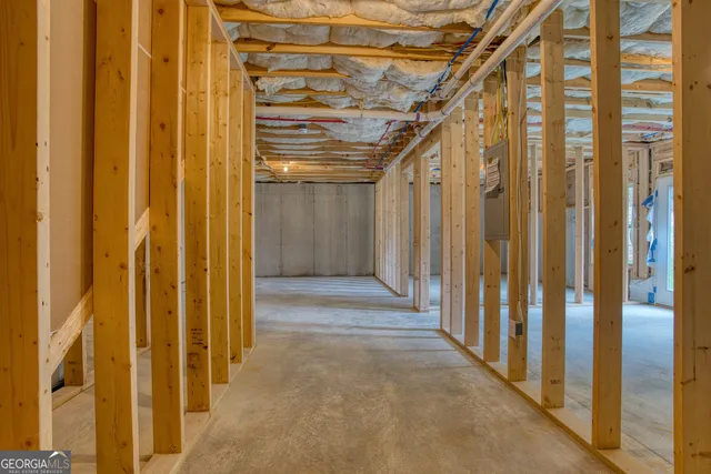 a view of a bathroom with wooden floor