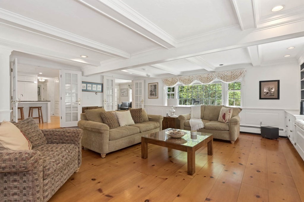 28 Gunnison Road Boxford, MA 01921 - Photo 11 of 37 a living room with furniture and a large window