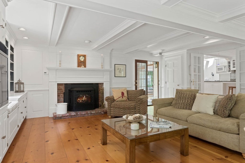 28 Gunnison Road Boxford, MA 01921 - Photo 12 of 37 a living room with furniture and a fireplace