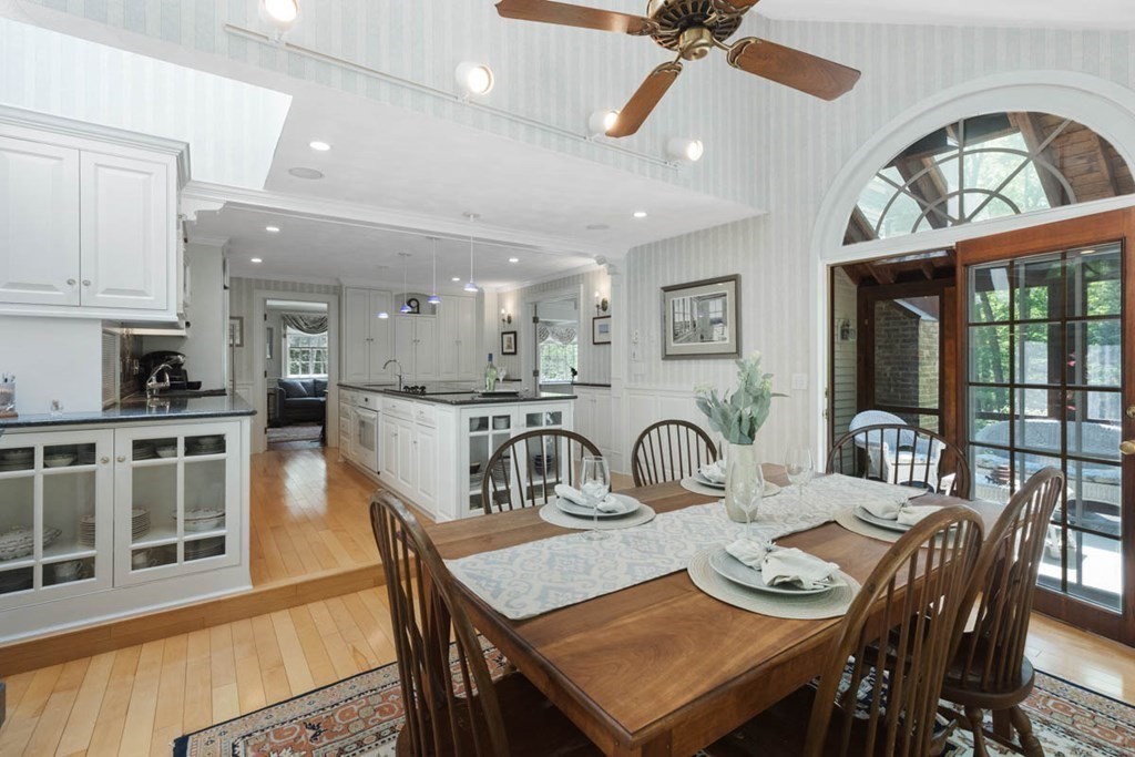 28 Gunnison Road Boxford, MA 01921 - Photo 17 of 37 a view of a a dining room with furniture window and wooden floor