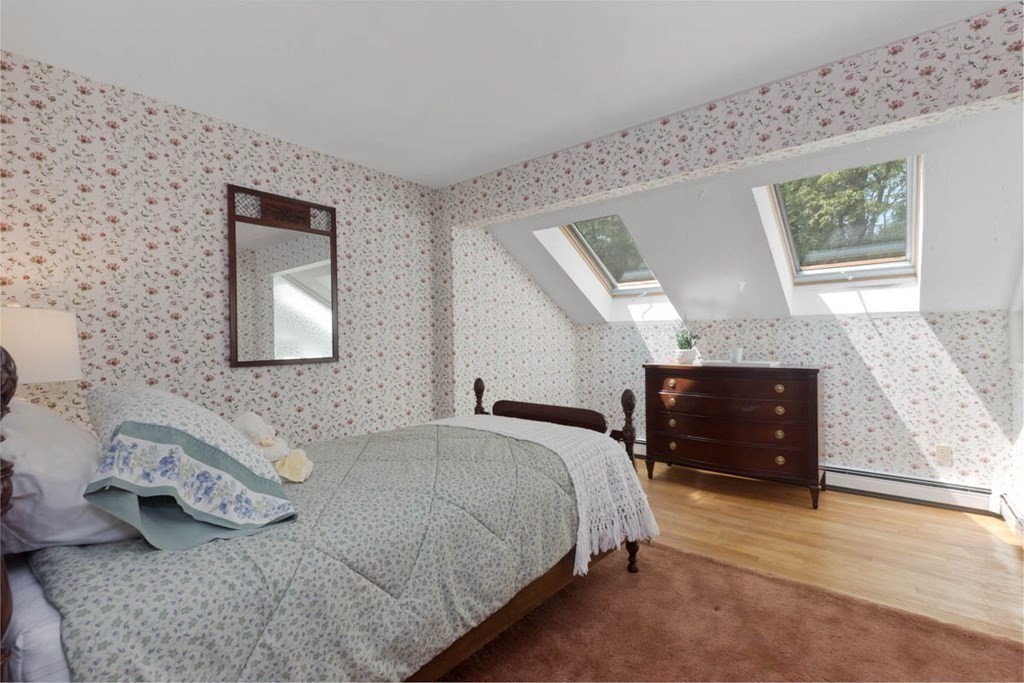 28 Gunnison Road Boxford, MA 01921 - Photo 23 of 37 a bedroom with a bed and a dresser