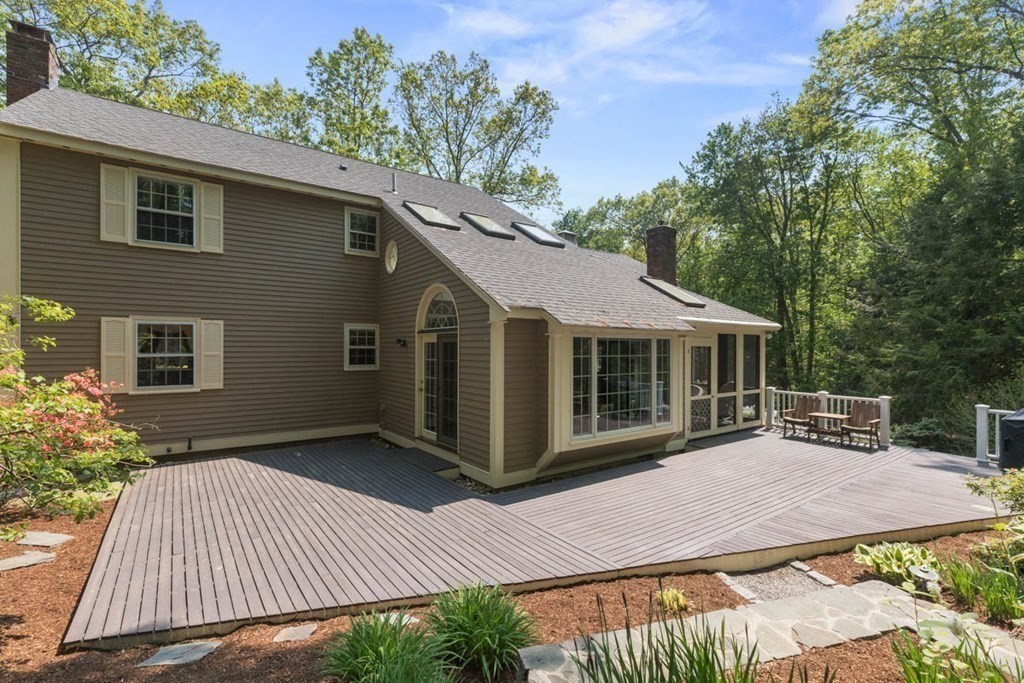 28 Gunnison Road Boxford, MA 01921 - Photo 33 of 37 a view of a house with a yard