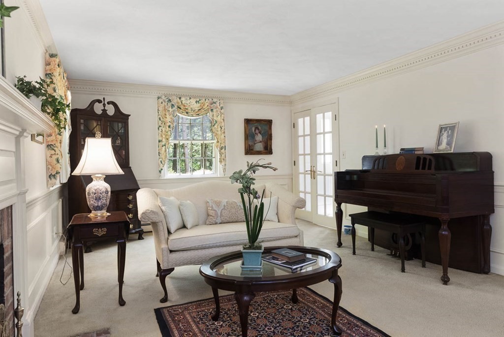 28 Gunnison Road Boxford, MA 01921 - Photo 5 of 37 a living room with furniture a window and a piano