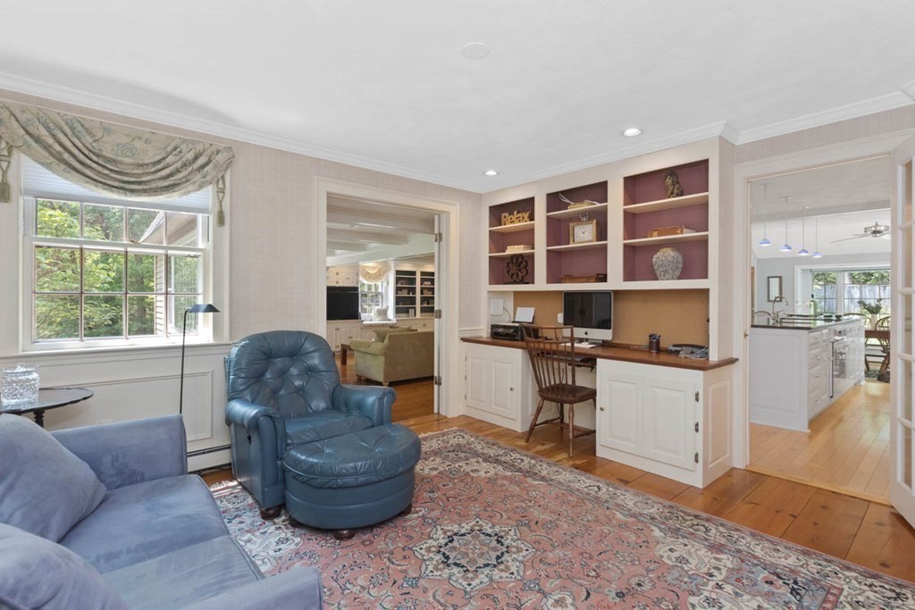 28 Gunnison Road Boxford, MA 01921 - Photo 8 of 37 a living room with furniture and a large window