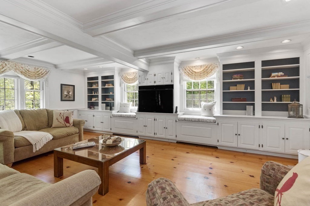 28 Gunnison Road Boxford, MA 01921 - Photo 9 of 37 a living room with furniture and a flat screen tv