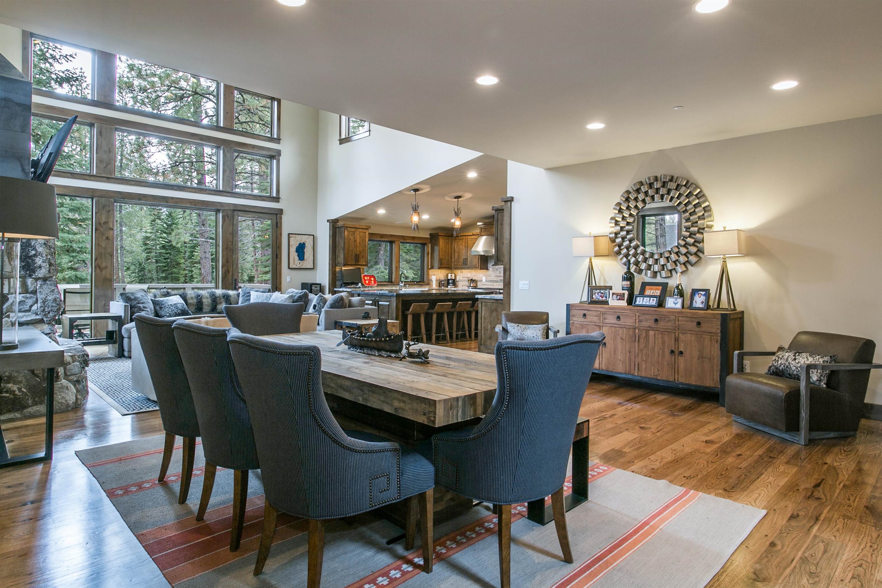 10605 Carson Range Road Truckee, CA 96161 - Photo 15 of 20 a view of a dining room with furniture window and wooden floor