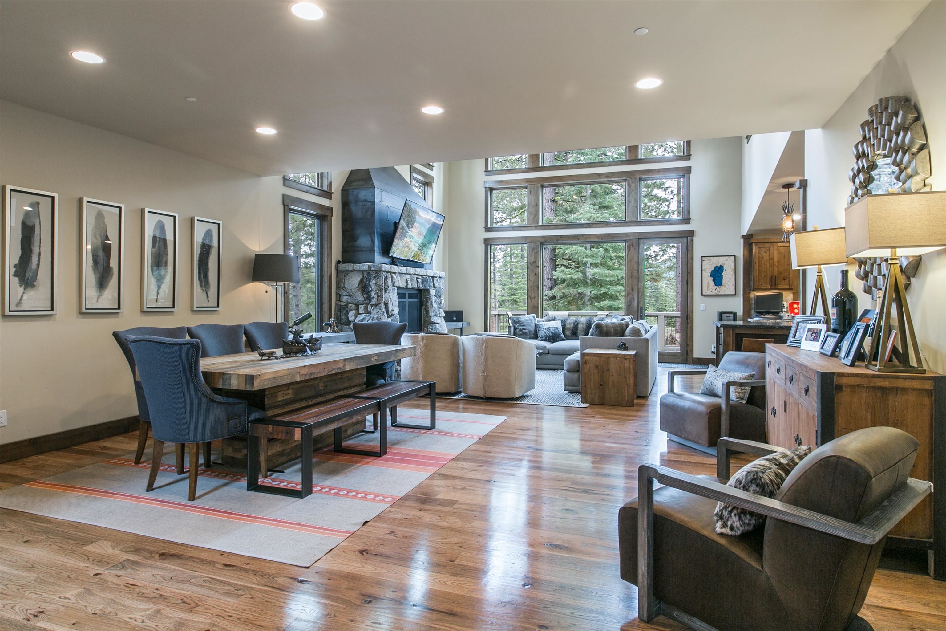 10605 Carson Range Road Truckee, CA 96161 - Photo 16 of 20 a living room with furniture a rug and a large window