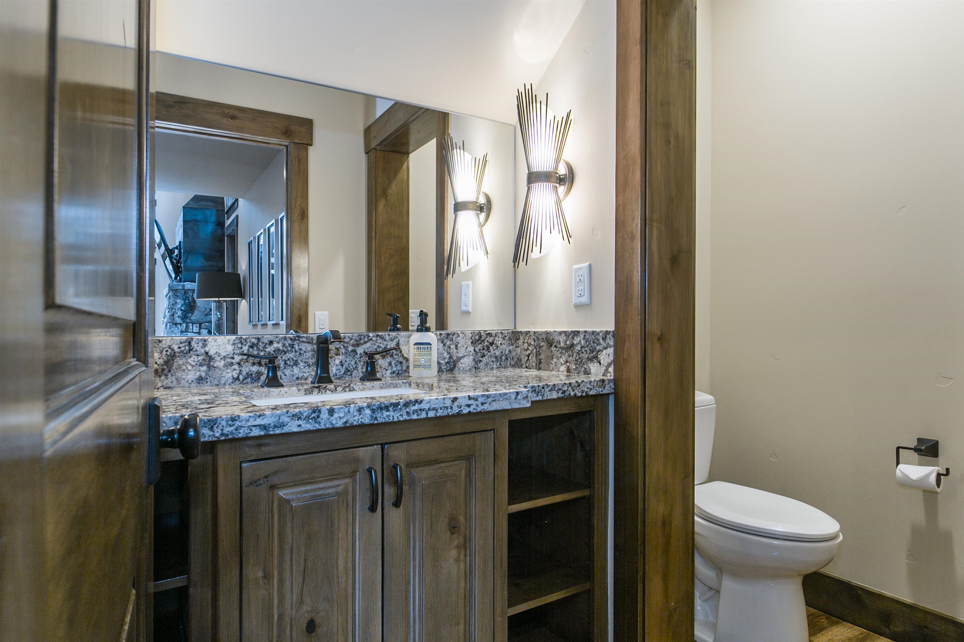 10605 Carson Range Road Truckee, CA 96161 - Photo 10 of 20 a bathroom with a granite countertop sink and a mirror