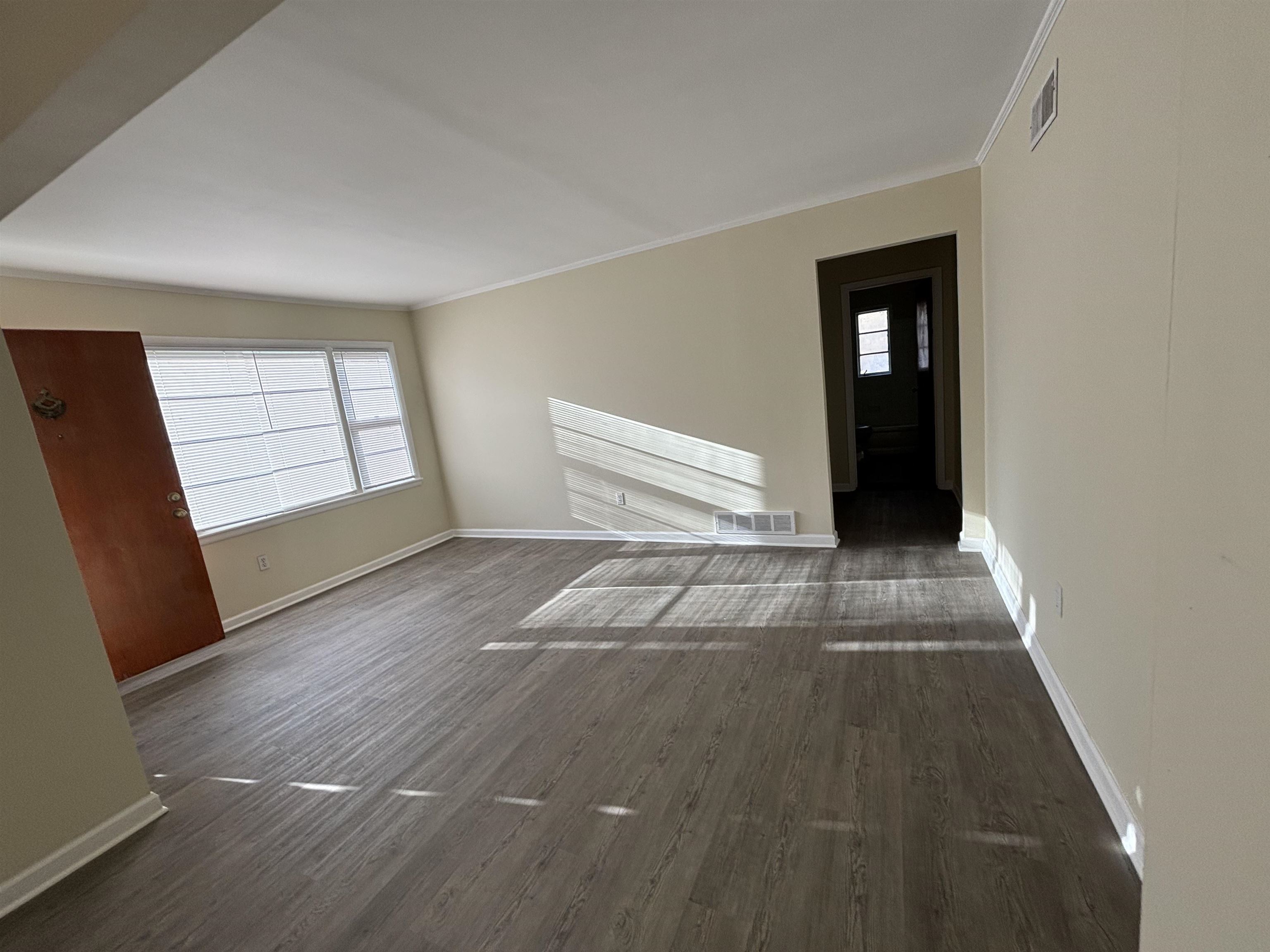 1548 Ivy Road Memphis, TN 38117 - Photo 3 of 14 an empty room with windows