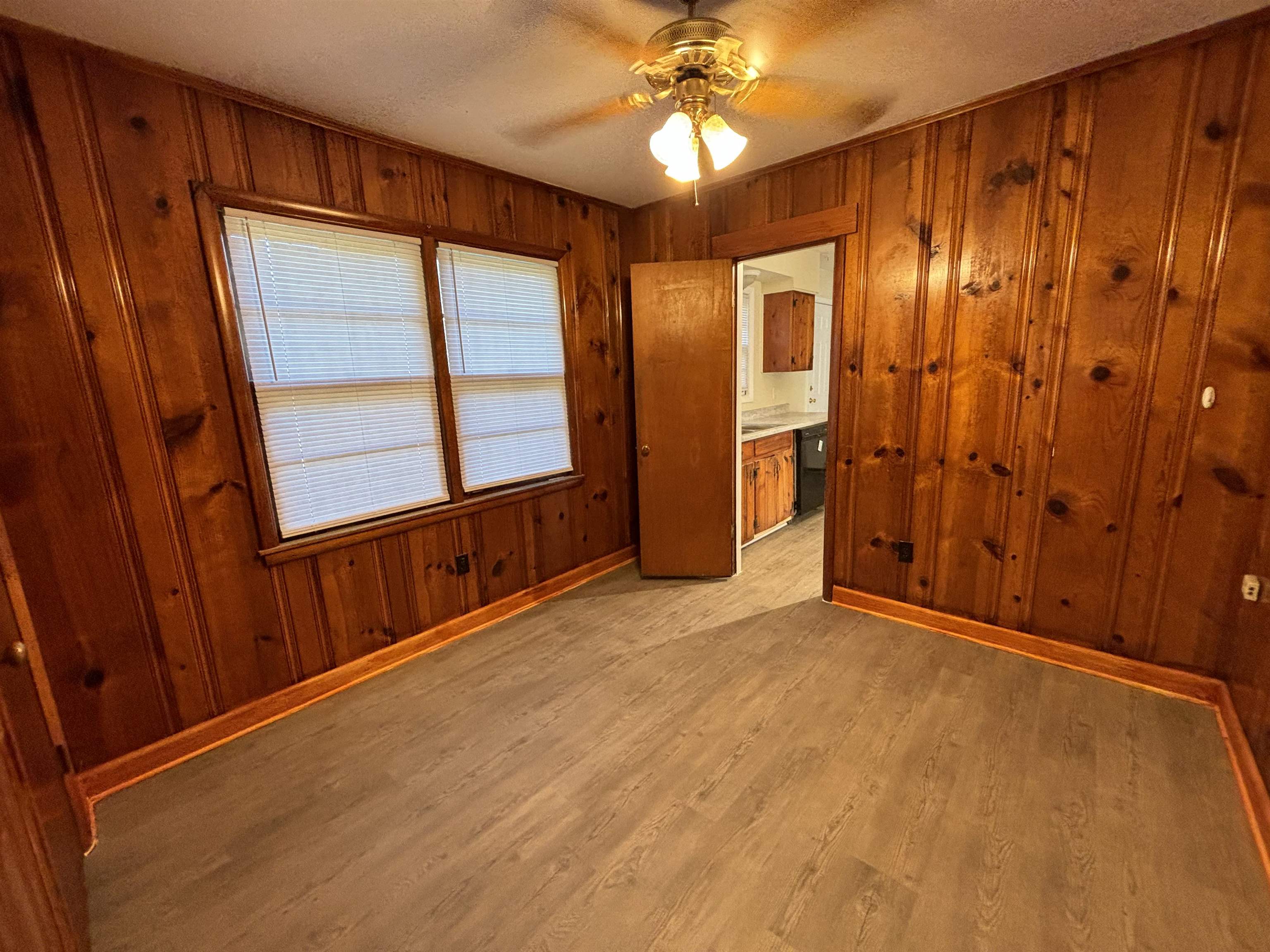 1548 Ivy Road Memphis, TN 38117 - Photo 8 of 14 a view of an empty room with a window