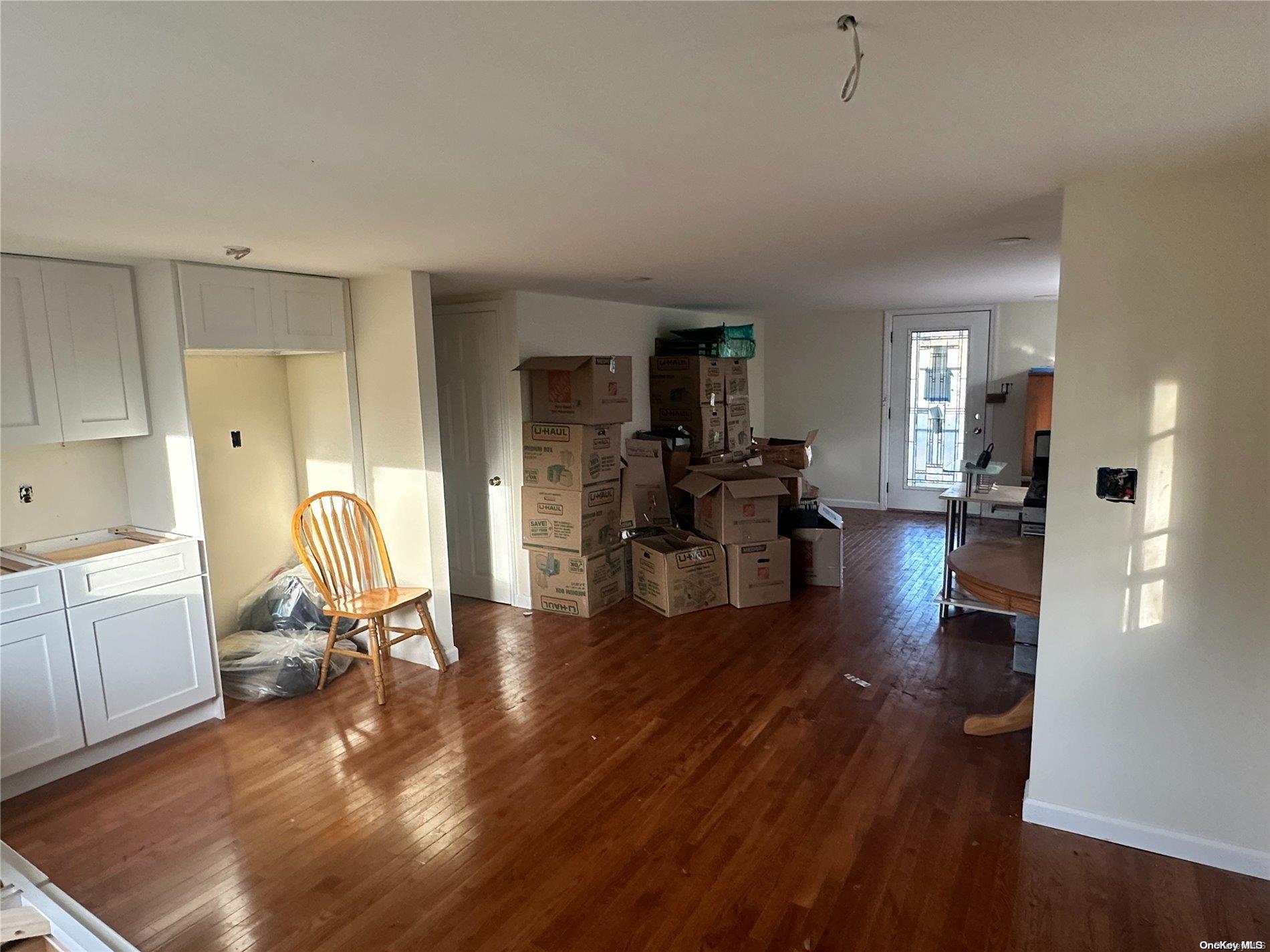 68 Tarpon Road Rocky Point, NY 11778 - Photo 5 of 23 a view of a livingroom with furniture and a workspace