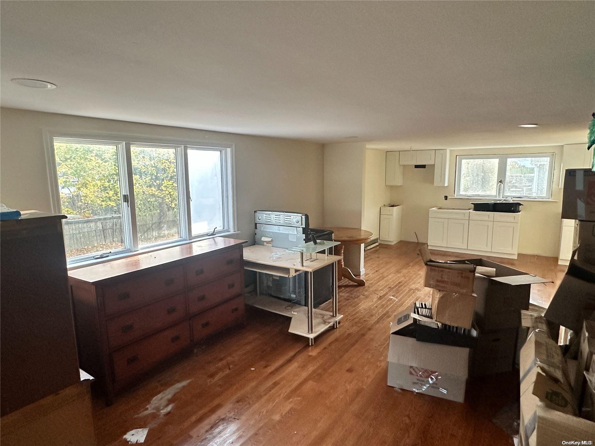 68 Tarpon Road Rocky Point, NY 11778 - Photo 6 of 23 a living room with furniture and a window