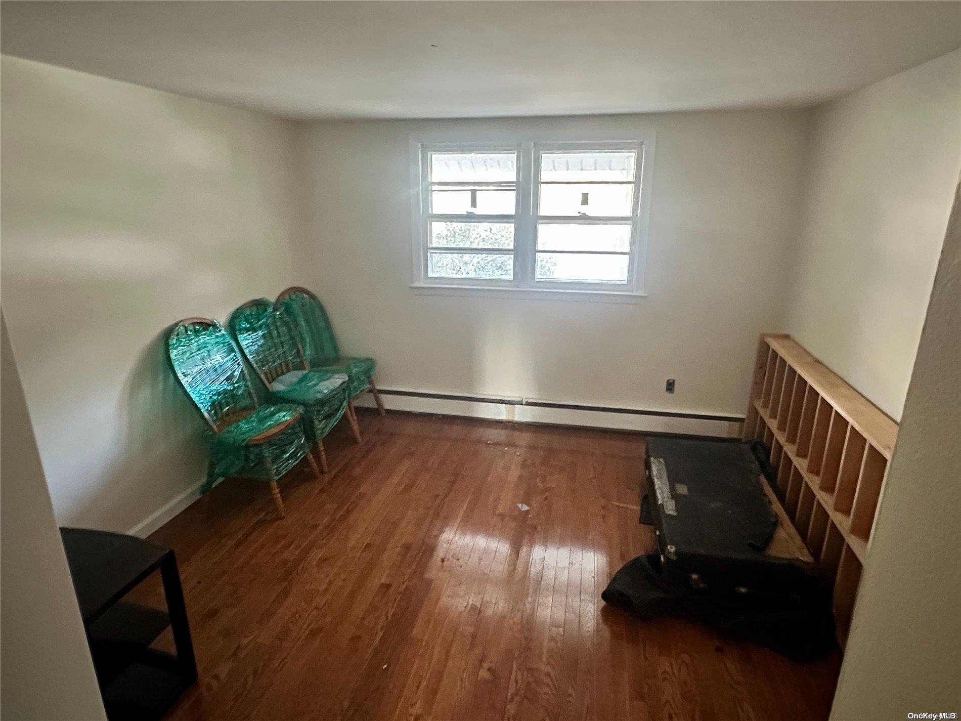 68 Tarpon Road Rocky Point, NY 11778 - Photo 9 of 23 a living room with furniture and a window