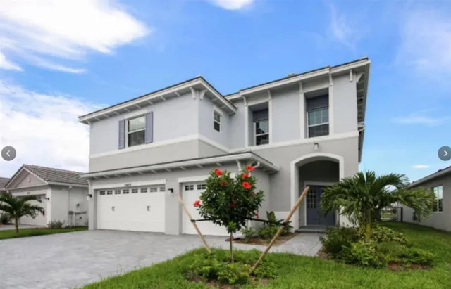 a bathroom with a sink a toilet and bathtub