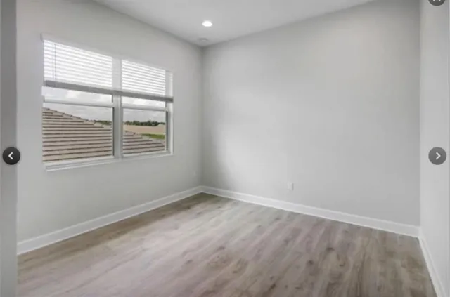 a view of a garden and trees