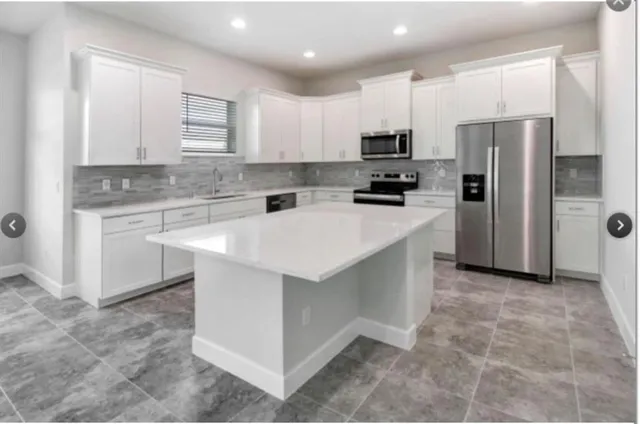 a view of entryway with stairs