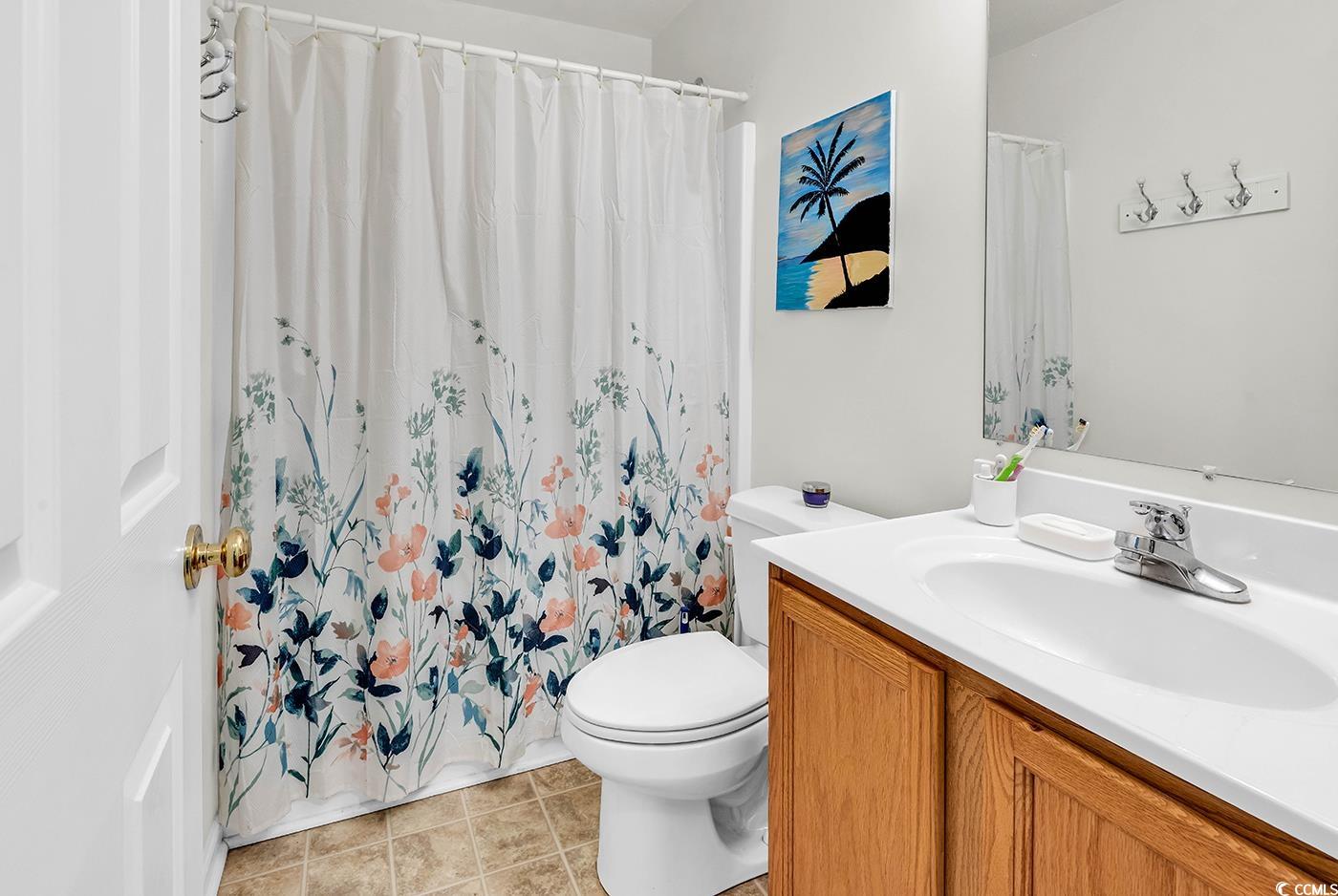 454 Sean River Road Conway, SC 29526 - Photo 22 of 38 Full bath featuring toilet, vanity, and curtained shower
