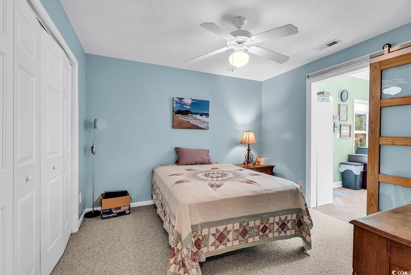 454 Sean River Road Conway, SC 29526 - Photo 23 of 38 Bedroom featuring a closet, baseboards, and a ceiling fan