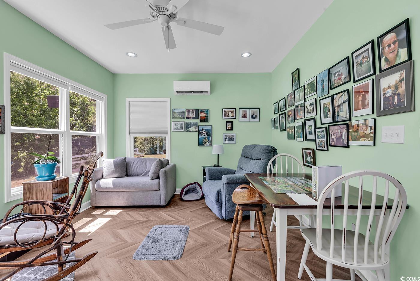 454 Sean River Road Conway, SC 29526 - Photo 27 of 38 Living area featuring an AC wall unit, recessed lighting, a ceiling fan, and baseboards