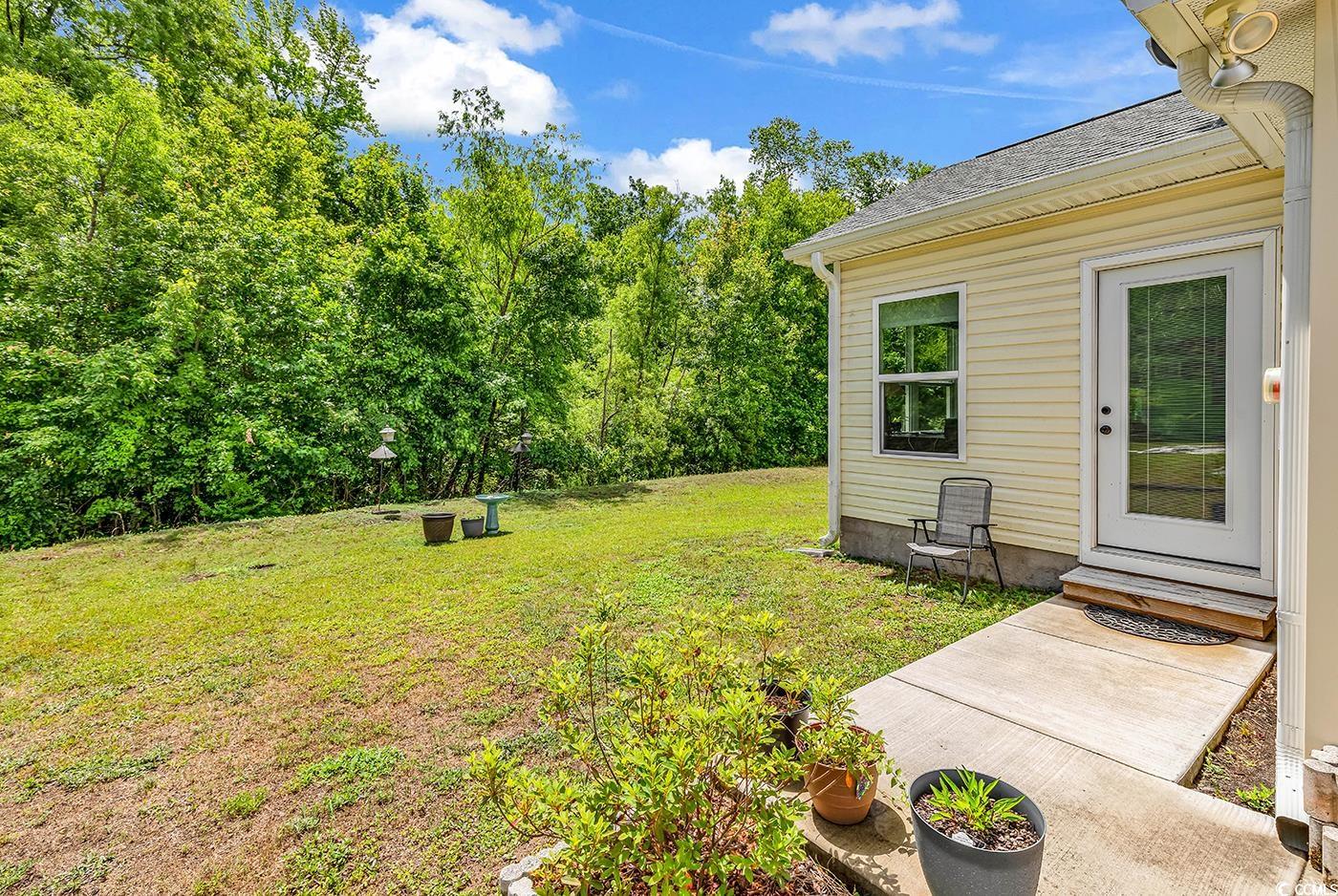 454 Sean River Road Conway, SC 29526 - Photo 35 of 38 View of green lawn