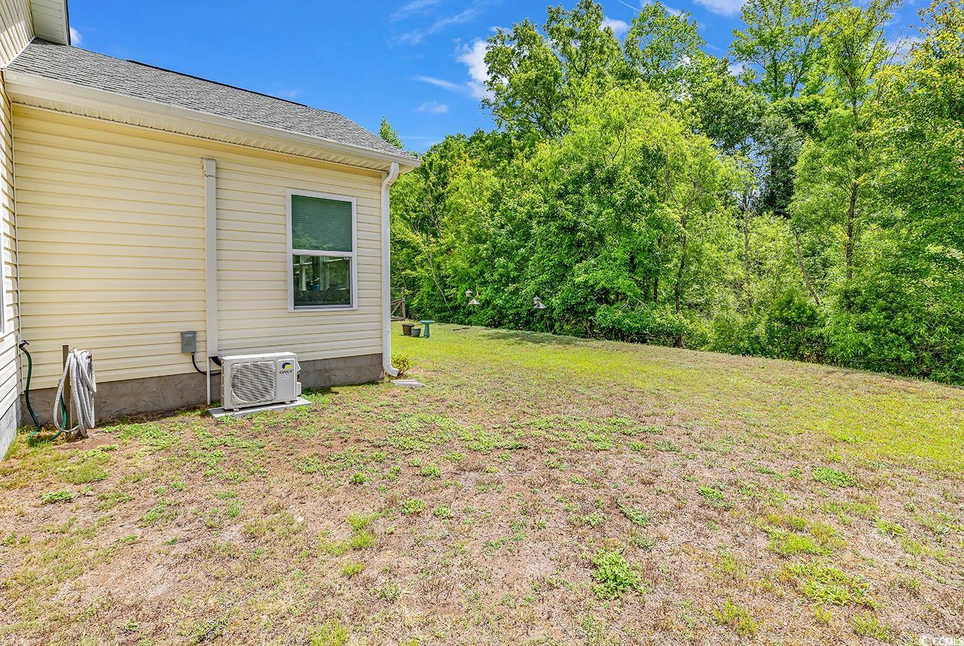 454 Sean River Road Conway, SC 29526 - Photo 38 of 38 View of grassy yard featuring ac unit