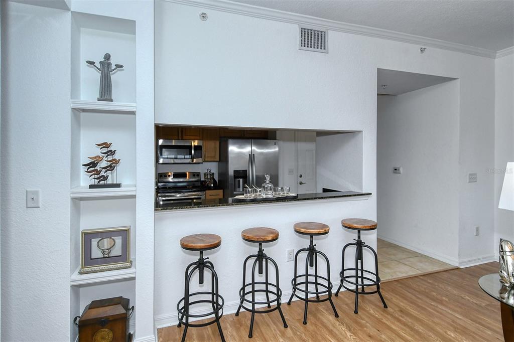 1064 North Tamiami Trail, Unit 1627 Sarasota, FL 34236 - Photo 11 of 97 a kitchen with table and chairs