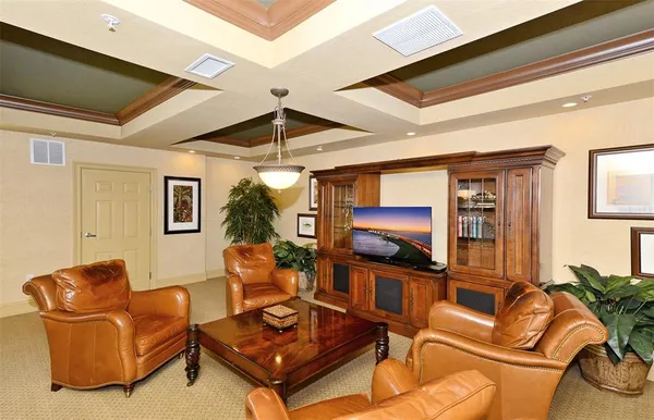 a view of a swimming pool with a lounge chairs