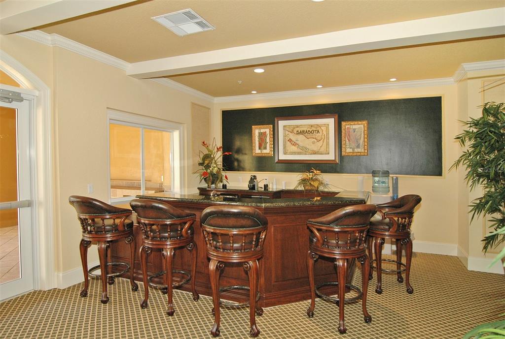 1064 North Tamiami Trail, Unit 1627 Sarasota, FL 34236 - Photo 33 of 97 a view of a a dining room with furniture window and wooden floor