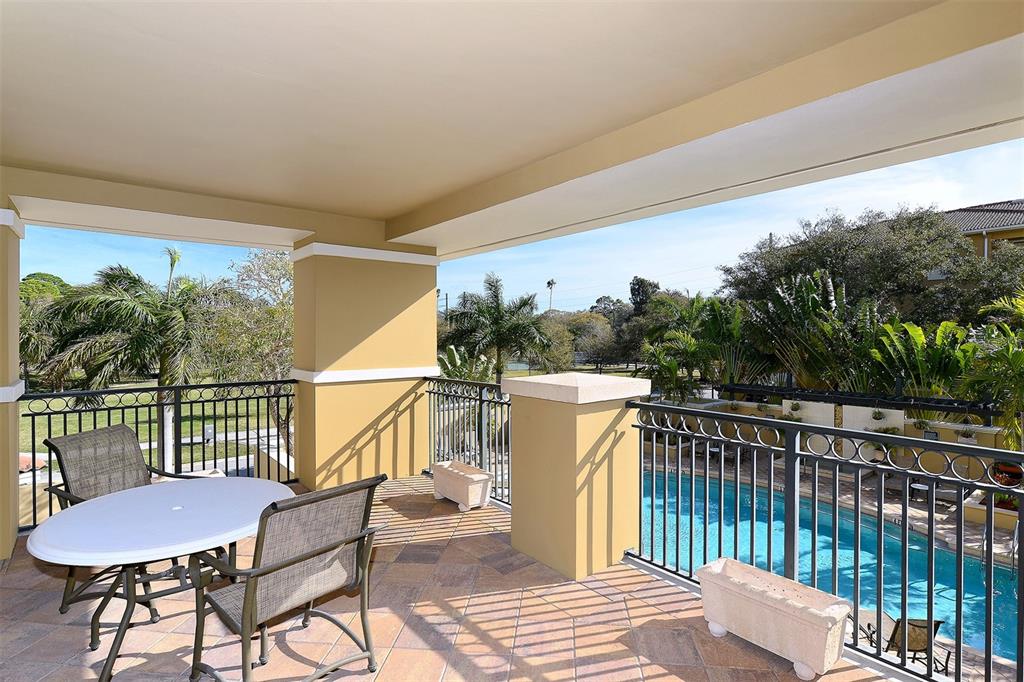 1064 North Tamiami Trail, Unit 1627 Sarasota, FL 34236 - Photo 36 of 97 a view of a chairs and table in the balcony