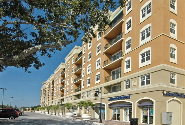 a view of street with lots of people
