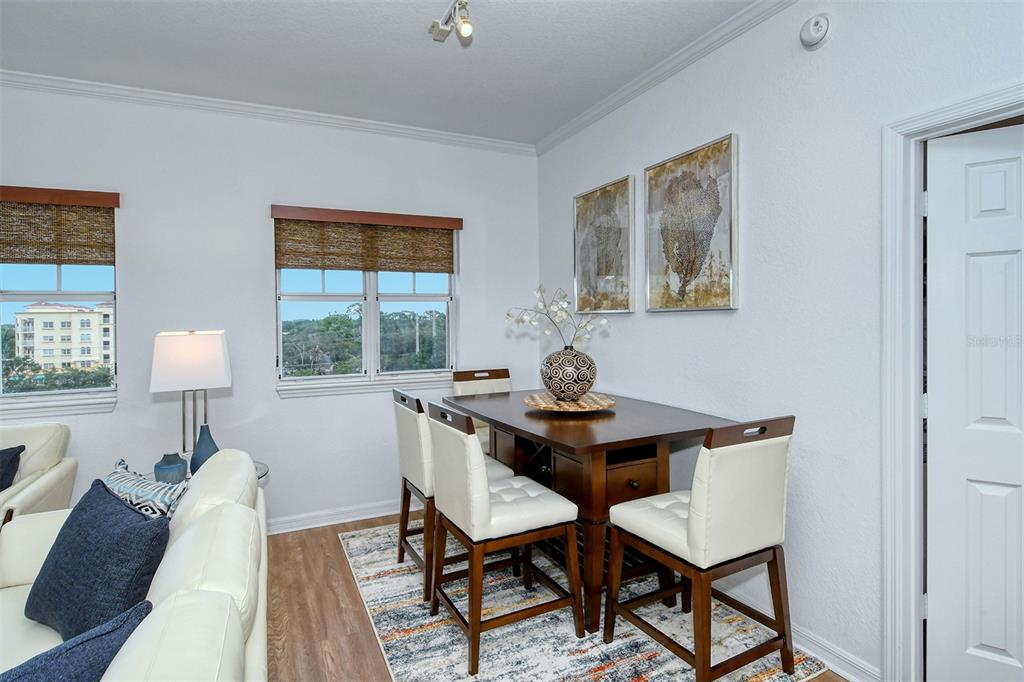 1064 North Tamiami Trail, Unit 1627 Sarasota, FL 34236 - Photo 9 of 97 a view of a workspace with furniture and a window