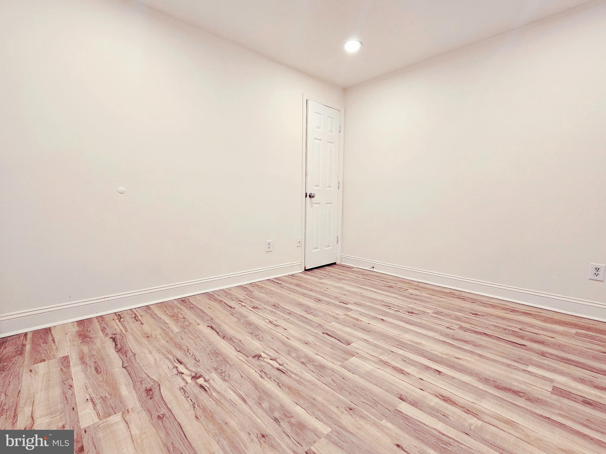 605 Villager Circle Baltimore, MD 21222 - Photo 24 of 41 a view of empty room with wooden floor