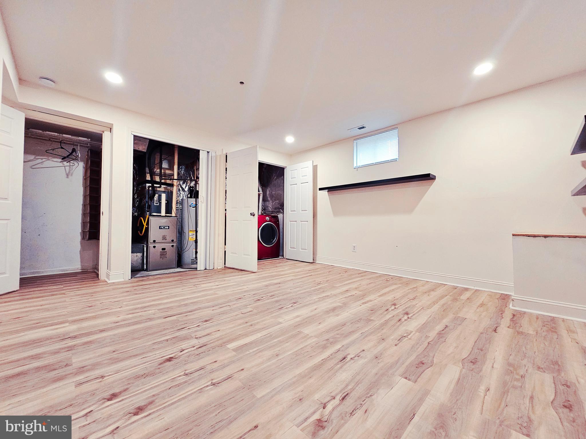 605 Villager Circle Baltimore, MD 21222 - Photo 30 of 41 a view of empty room with wooden floor