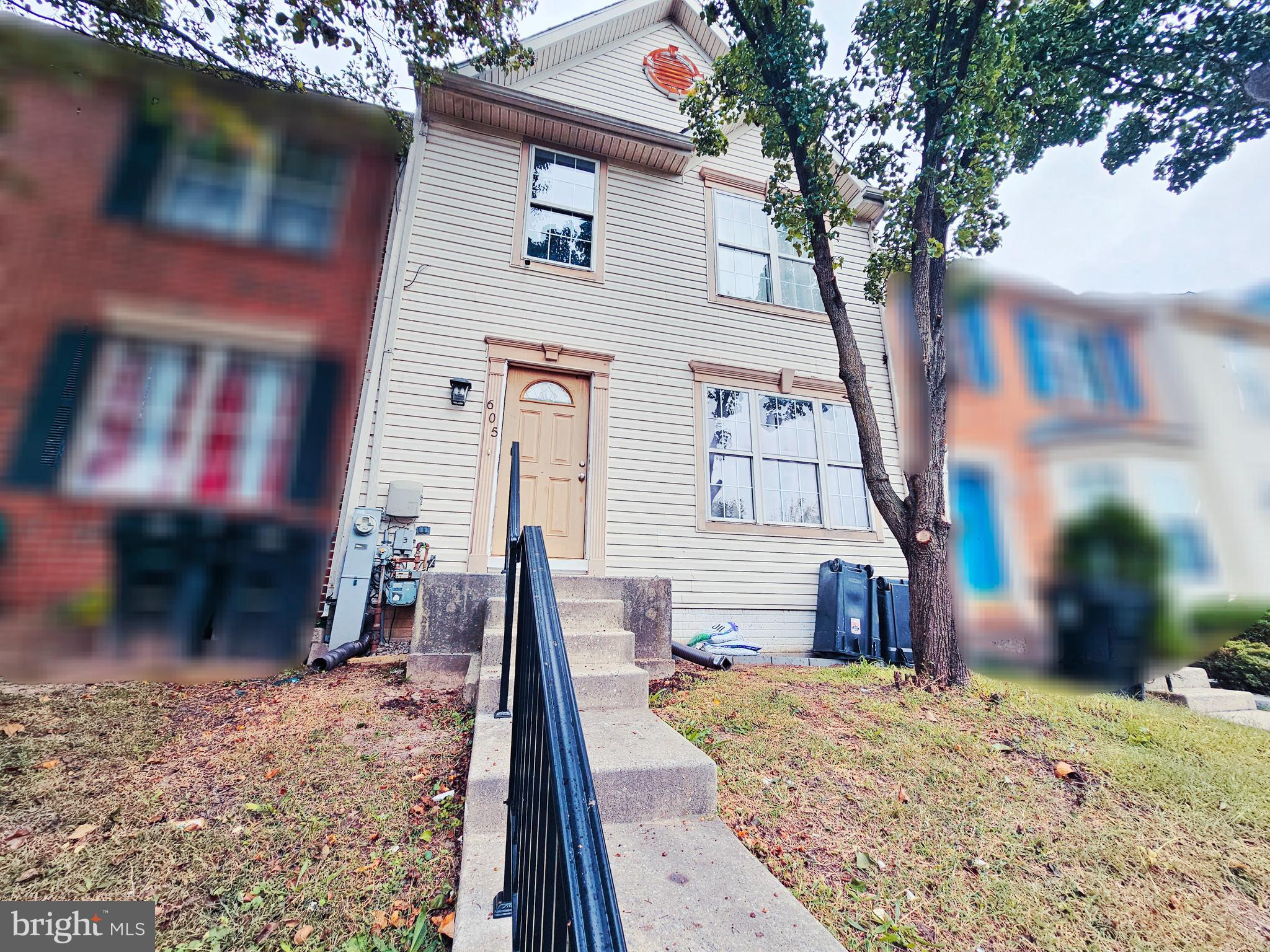 605 Villager Circle Baltimore, MD 21222 - Photo 3 of 41 a view of a house with a snow on the road