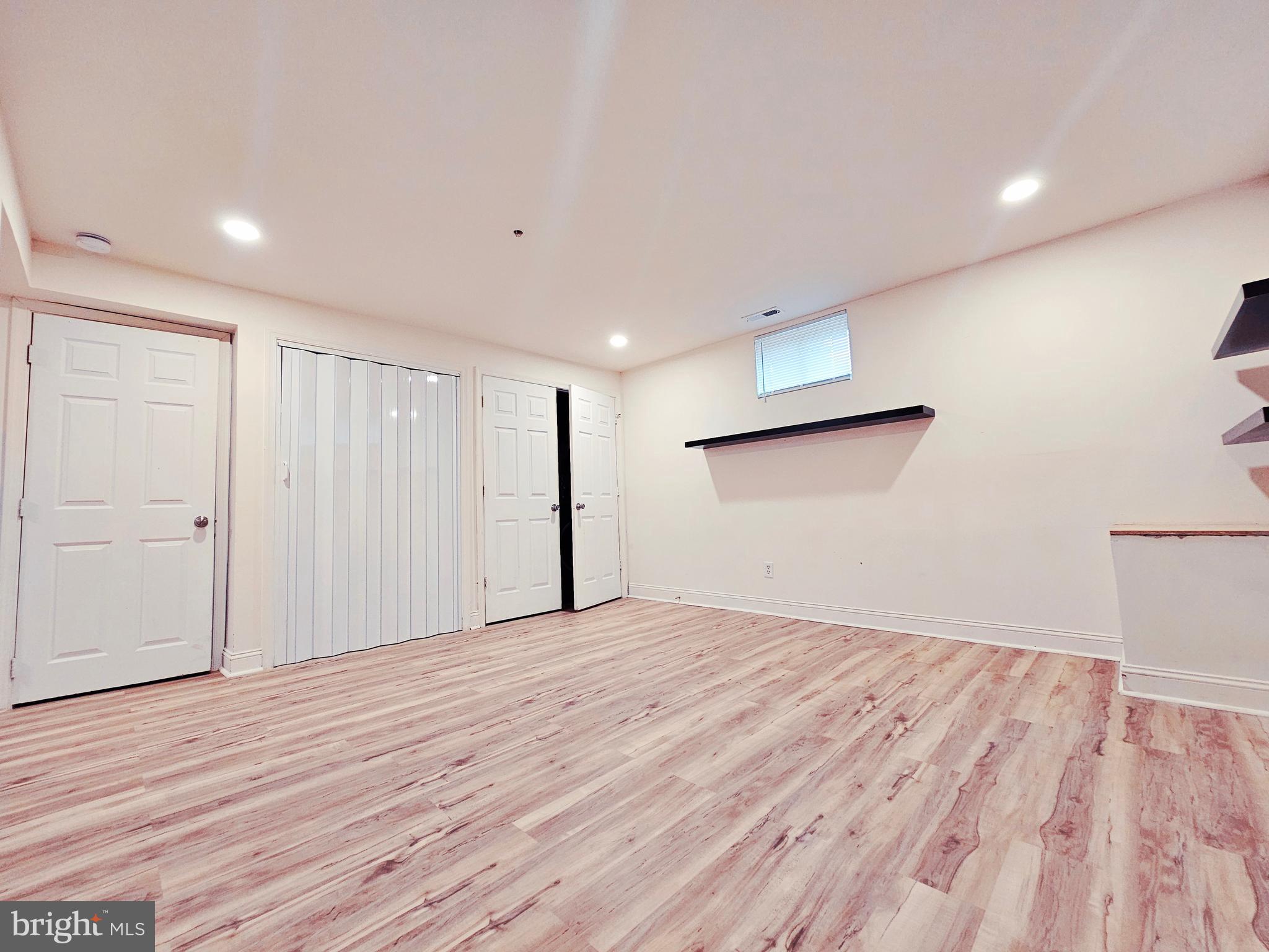 605 Villager Circle Baltimore, MD 21222 - Photo 31 of 41 a view of an empty room with wooden floor