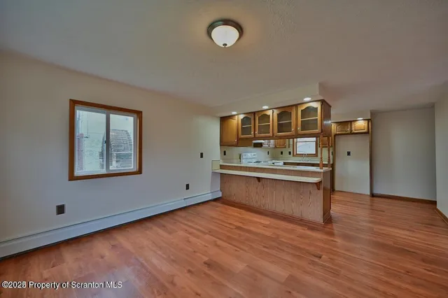 a living room with a wooden floors