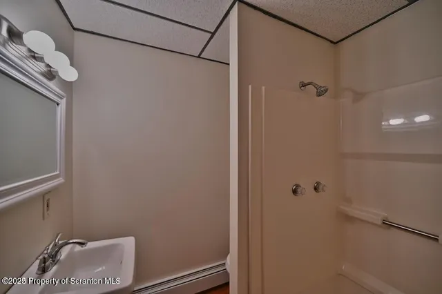 a view of a room with a wooden walls