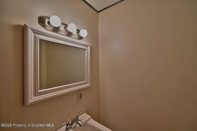 a view of a room with rack on the wall