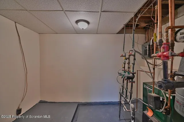 a view of storage and utility room