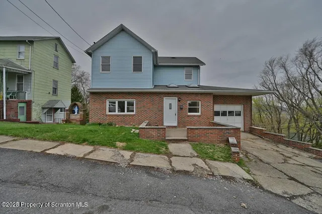 a picture of a bathroom with a shower