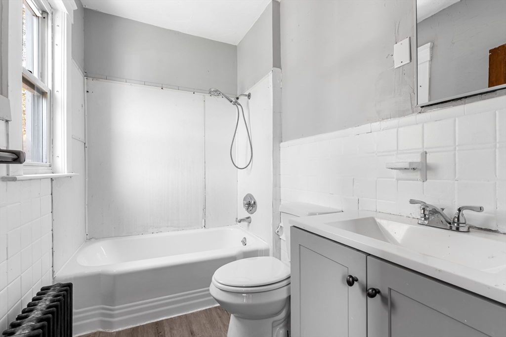 105 Conant Street Gardner, MA 01440 - Photo 4 of 19 a bathroom with a granite countertop sink toilet and shower